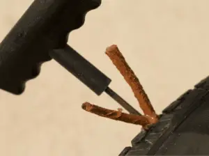 tire-being-plugged