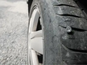 tire-with-nail-stuck