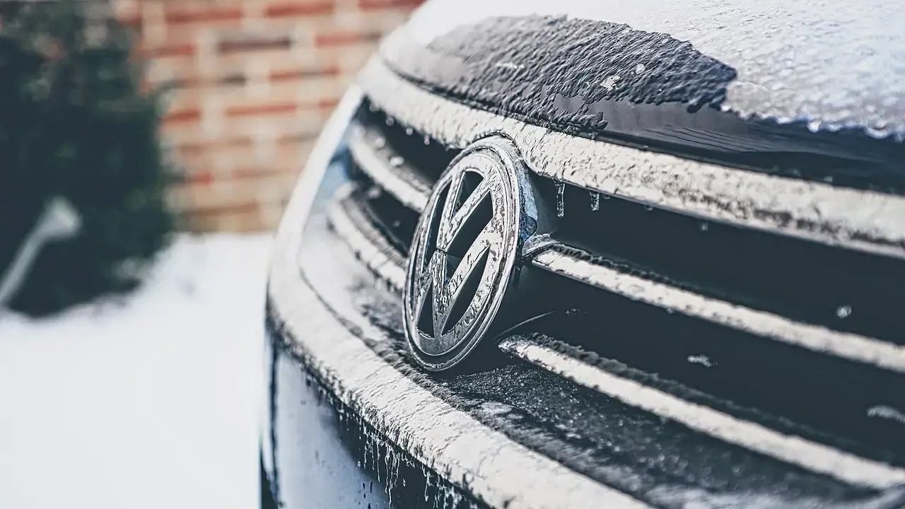 Volkswagen grill up close with frost on it