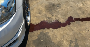 reddish leak coming from car radiator